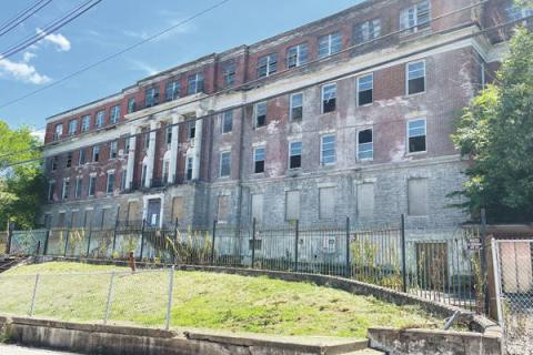exterior view of dilapidated Hayswood Hospital in Maysville, KY